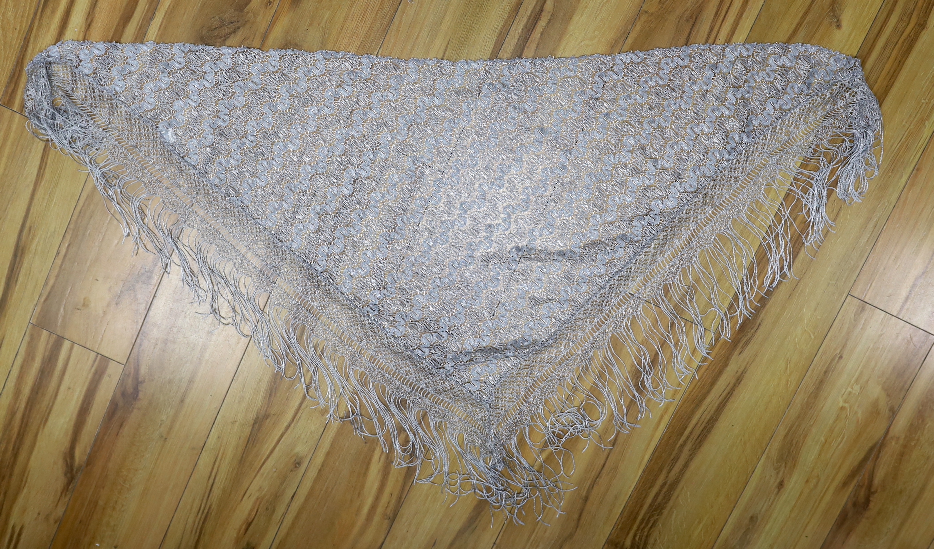An evening purse, a shawl and pair of blue gloves